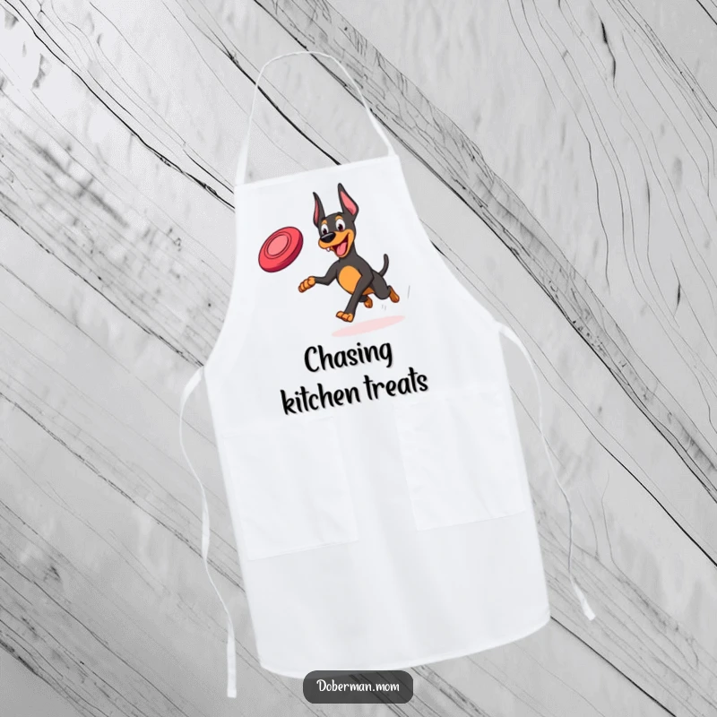 Funny Frisbee Doberman Apron: A Doberman joyfully running with a frisbee, ready to assist in the kitchen with zest.