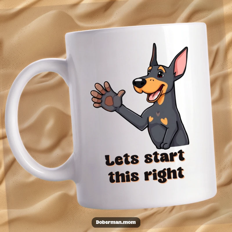 Funny Doberman mug featuring a delighted dog offering a friendly paw for a handshake, exuding warmth and approachability.