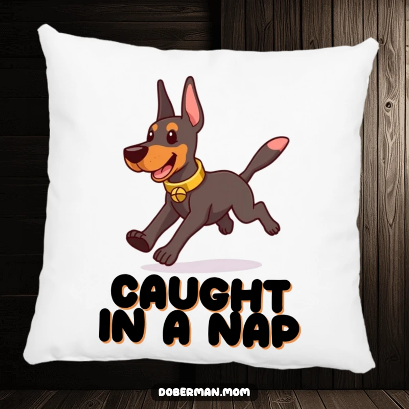 Funny Doberman wearing a tinkling bell collar, playfully chasing its tail, featured on a soft decorative pillow.