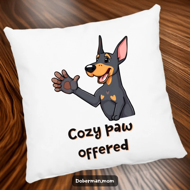 Funny Doberman pillow featuring a delighted dog offering a friendly paw, perfect for cozying up with humorous warmth.