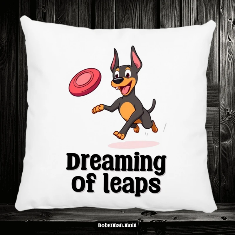 Funny Frisbee Doberman Pillow: A plush pillow showing a Doberman joyfully running with a frisbee, perfect for cozying up.