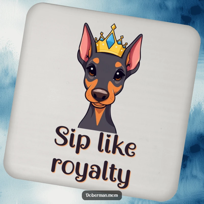 Funny Regal Doberman coaster featuring a small, jeweled crown, providing majestic humor and protecting surfaces with canine dignity.