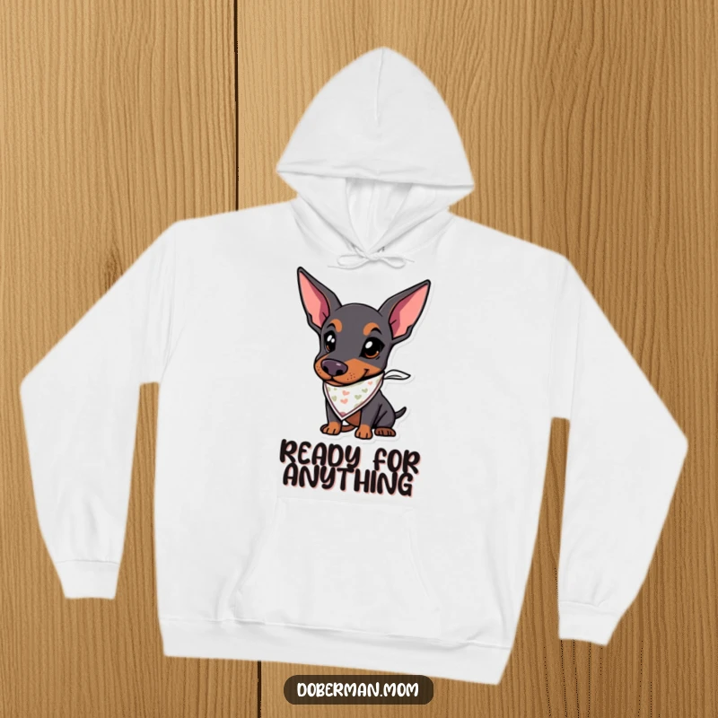 Funny hoodie showcasing a Doberman dog wearing a cute bandana, exuding readiness and excitement for outdoor adventures.