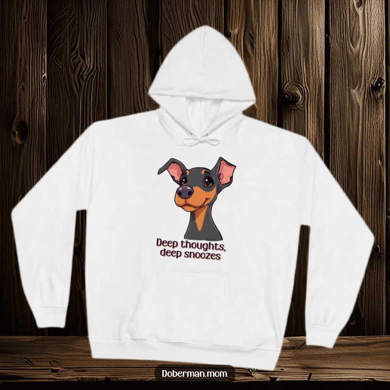 Funny Doberman hoodie featuring a dog in a cozy hood with a curious head tilt, embodying playful observation.