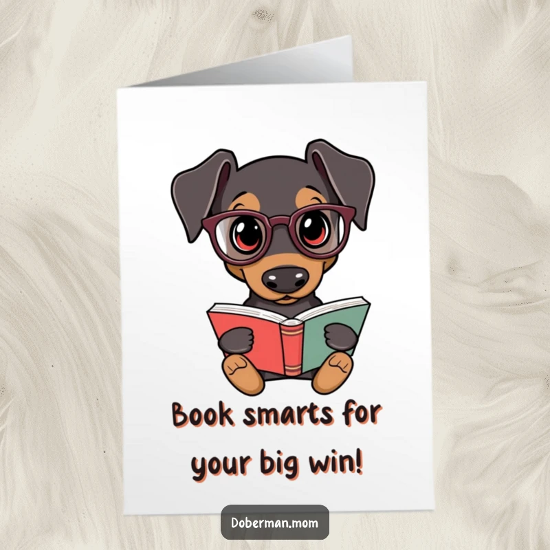 Funny Free Printable Doberman congratulations card showing a dog in glasses looking proud with a book.