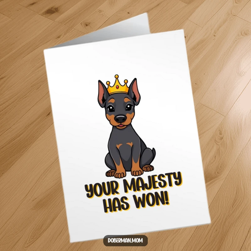 Funny Free Printable Congrats Card: A Doberman wearing a tiny crown sits attentively, acknowledging a momentous occasion.