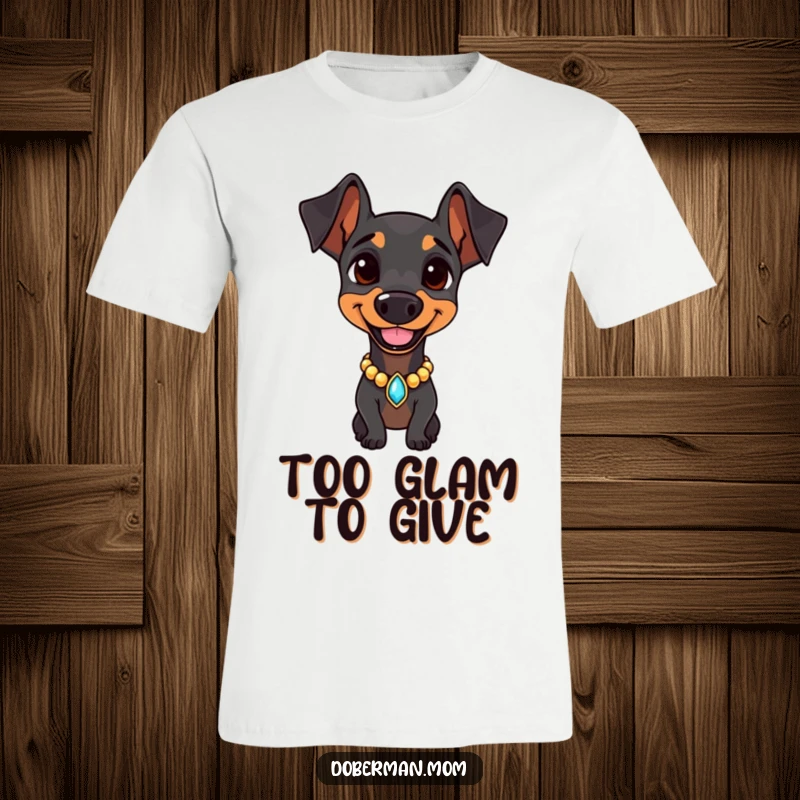 Doberman with a jeweled collar, confidently smiling and looking regal on a t-shirt, representing stylish canine pride.