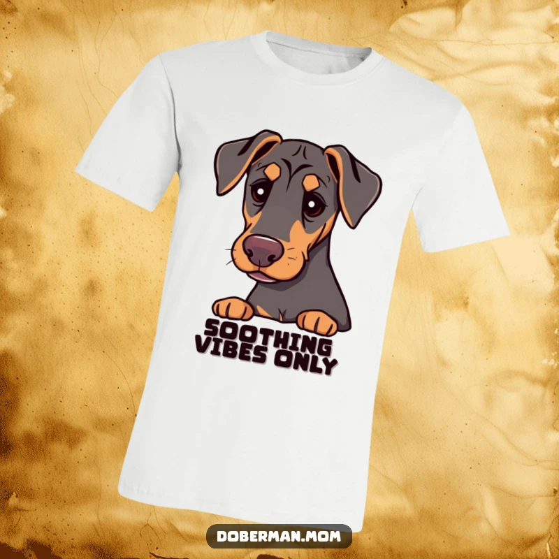 A Doberman with gentle, kind eyes, offering a comforting presence, is depicted on this heartwarming t-shirt.