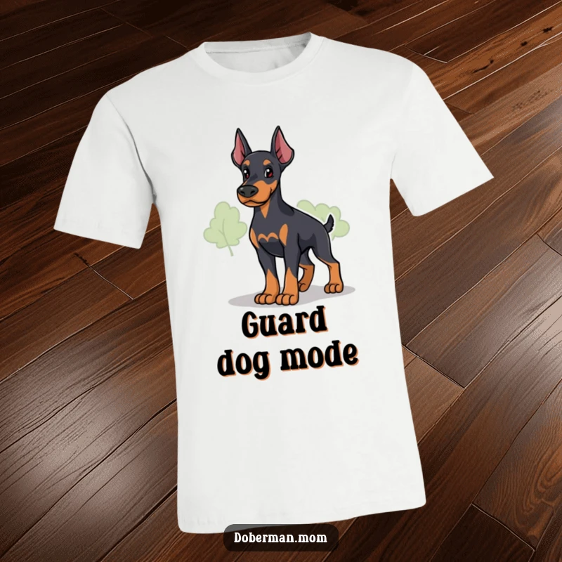 Funny Loyal Doberman Guardian T-Shirt: a dog stands protectively and surveys; humorous apparel for loyal dog lovers.