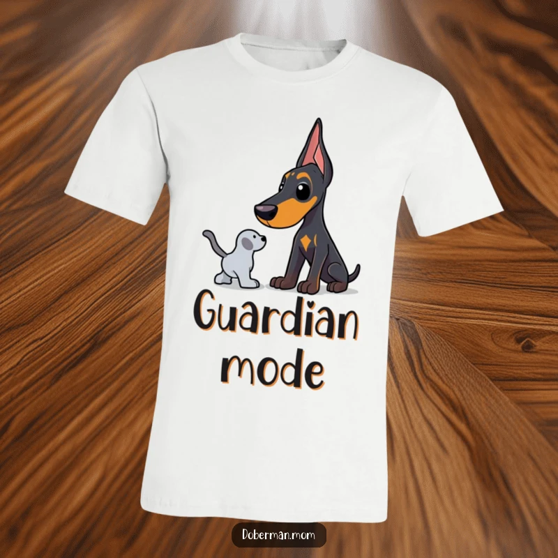 Funny Doberman t-shirt depicting a dog in a strong protective stance, safeguarding a toy with humorous vigilance.