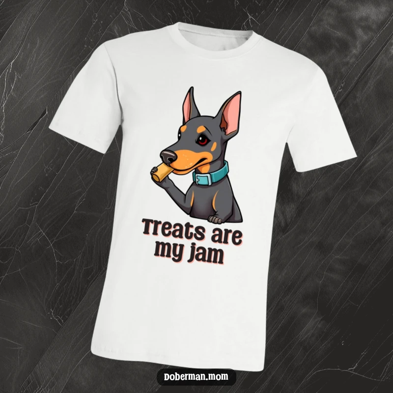Funny Doberman t-shirt featuring a fashionably collared dog playfully nudging for a treat, showing off cute determination and humor.