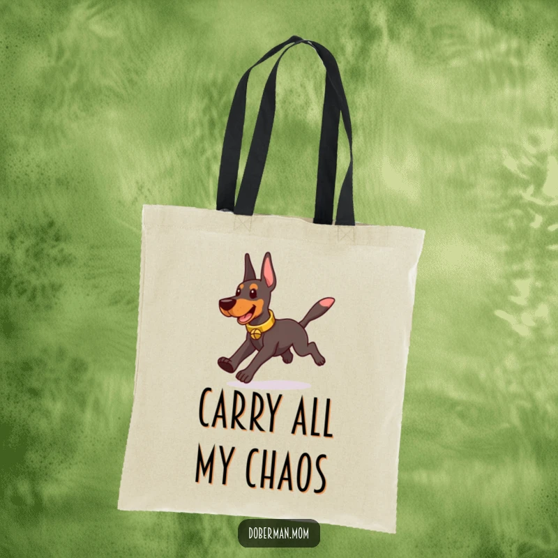 Funny Doberman wearing a tinkling bell collar, playfully chasing its own tail, printed on a durable tote bag.