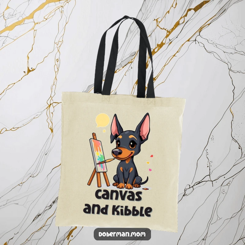 Funny Doberman artist tote bag with a dog holding a paintbrush, working on a colorful and abstract masterpiece.