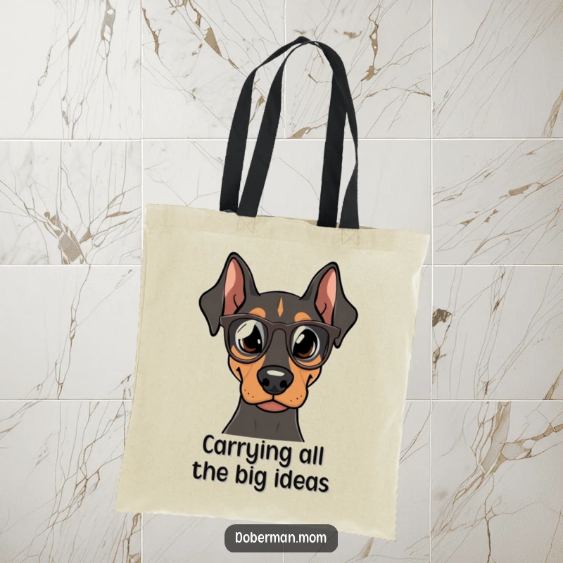 Funny Doberman Bookworm Tote Bag, an intelligent dog with tiny spectacles, carrying books, a practical and humorous accessory gift.
